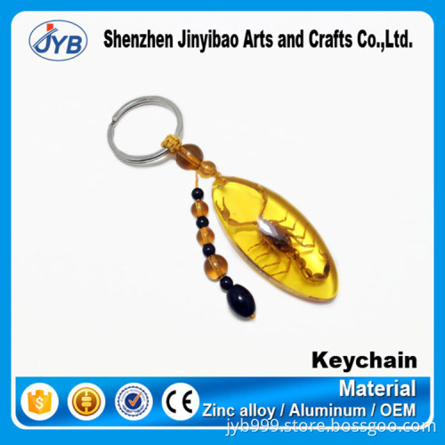 hot sale customized clover amber keychain
